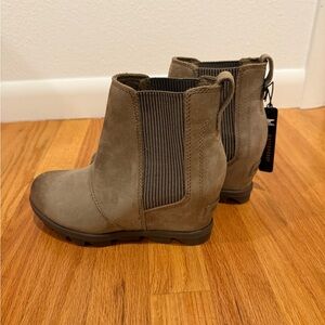 New.  Never worn Sorel wedge boots. Women’s size 5.
